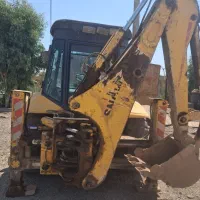 بیل لاستیکی هپکو۲۰۰۳وبیل بکهو سنوپارس ۲۲۰
