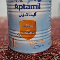 قوطی شیرخشک به همراه درب پلاستیکی تمیز