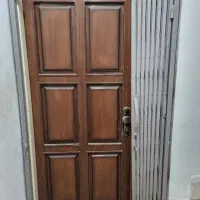 درب تمام چوب با محافظ کشویی