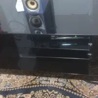 میز تلوزیون شیشه ای ۴ کشو