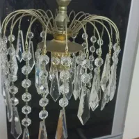 یک  لوستر برنز و کریستال و تابلو