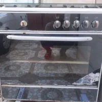 اجاق گاز ۵ شعله تمیز کم  کار زیاد استفاده نشده