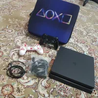 ps4  اسلیم یک ترابایت دو دسته و یک جفت فنر لنزو
