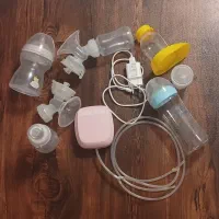 شیردوش برقی جوی میلک به همراه شیشه اضافه