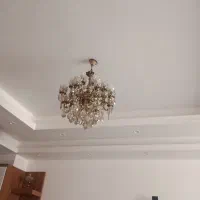 لوستر و ساعت دو عدد لوستر