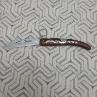 چاقوی آلمانی دنده دار ودسته چوب گردو