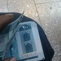 یک بسته اسکناس بیست تومنی نو تا نخورده پشت هم