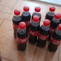 تعدادی نوشابه مشکی زمزم ۳۰۰سی سی