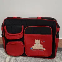 ساک نوزادی قرمز مشکی نو اصلا استفاده نشده