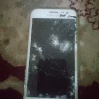 گوشی تاج و ال سی دی شکسته باطری هم ندارد