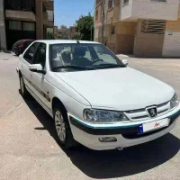 پژو پارس TU5 سفید چهار چرخ دیسک گاز سیمی
