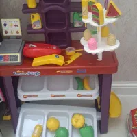 سوپر مارکت فروشگاهی و پمپ بنزین بچه گانه