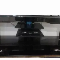 میز تلویزیون شیشه ای ۶۰۰هزار تومان مخصوص باغ