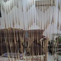 پرده آویز مرواریدی