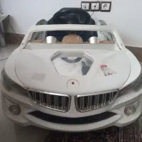 یک عدد ماشین شارژی و دو کیسه توپ