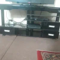 میز تلویزیون تمام شیشه سه طبقه  درحدنو