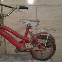 دوچرخه بچگانه با چرخ کمکی