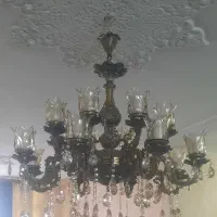 لوستر ۱۶شعله برنجی درحد نو و تمیز و قابل معاوضه