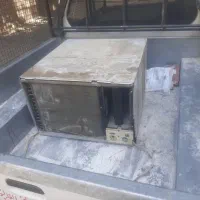 کولر گازی پشت پنجره