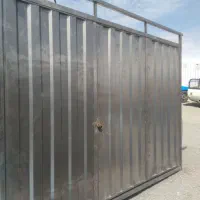 دروازه ساختمان وباغ