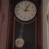 ساعت دیواری پاندولی / طرح چوب