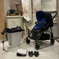 کالسکه مکسی کوزی maxi cosi در حد آک روبه مادر