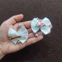 فروش انواع تل مو،گیره وگلسر،گردنبنددستبندو جاکلیدی