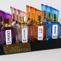فروش کلی عطر و ادکلن همراه استند چوبی