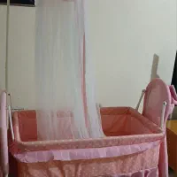 تخت گهواره ای نوزاد