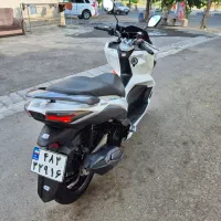 Sym jt200|موتورسیکلت|میانه, |دیوار
