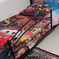تخت فرفورژه کودک،درحد نو،پارچه روی تخت کاملا سالم