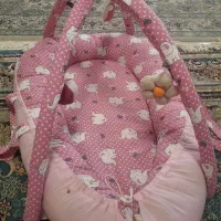 تشک بازی به همراه آغوشی نوزاد