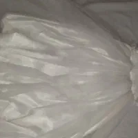 یک عدد پیراهن عروس دخترانه