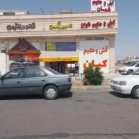 سوپر مارکت فعال تهاتر با زمین مسکونی و ویلای شمال