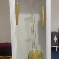 ساعت .دو تا تنگ ماهی و سه عدد دکوری طلایی