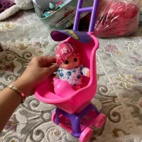 عروسک با کالسکه