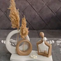 گلجا حلقه ای و مجسمه همدم