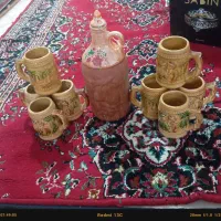 یک عدد کوزه و 8عدد لیوان سفالی