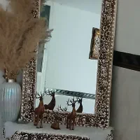 آیینه ساعت زیرتلویزیون