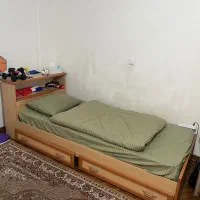 تخت یک نفره با کیفیت mdf کشودار به همراه کتابخانه
