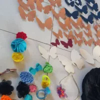 پروانه های رنگی وشمع وگل سرنمدی