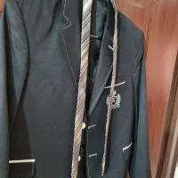 کت و کراوات نو .ده دوازده سال کاملا مشکی
