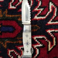 چاقو بابا و کلاه روسی