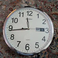 ساعت دیواری تقویم دار فارسی