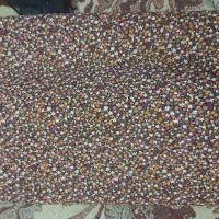 تعدادی پارچه چادری رنگی و مشکی