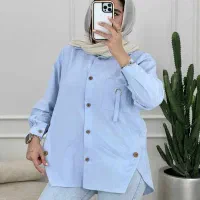 دوختن دکمه مانتو و شومیز