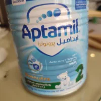 تعدای قوطی شیر اپتامیل