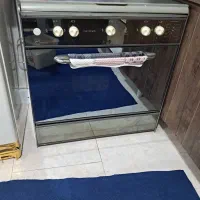 گاز و تلویزیون و میز تلویزیونو یخچال