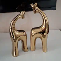 مجسمه دکوری زرافه طلایی