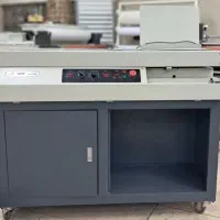دستگاه چسب گرم صنعتی - دستگاه چسب زن غلطکی